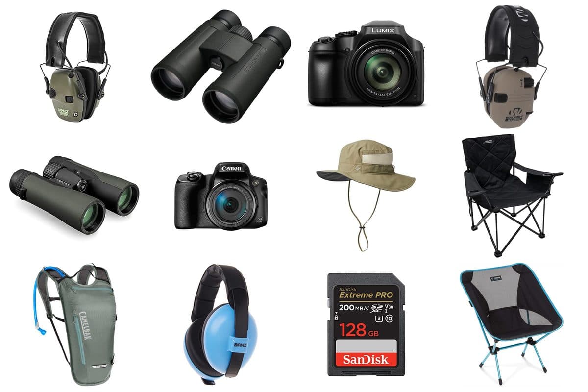 Airshow gear essentials including binoculars, ear protection, camera, and sun hat laid out on a table