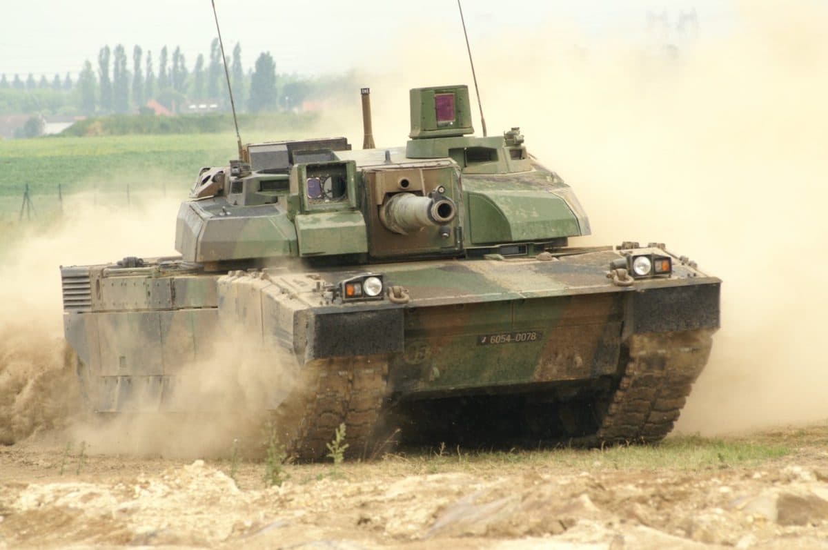 Leclerc main battle tank advancing across terrain showing its compact turret and 120mm smoothbore gun