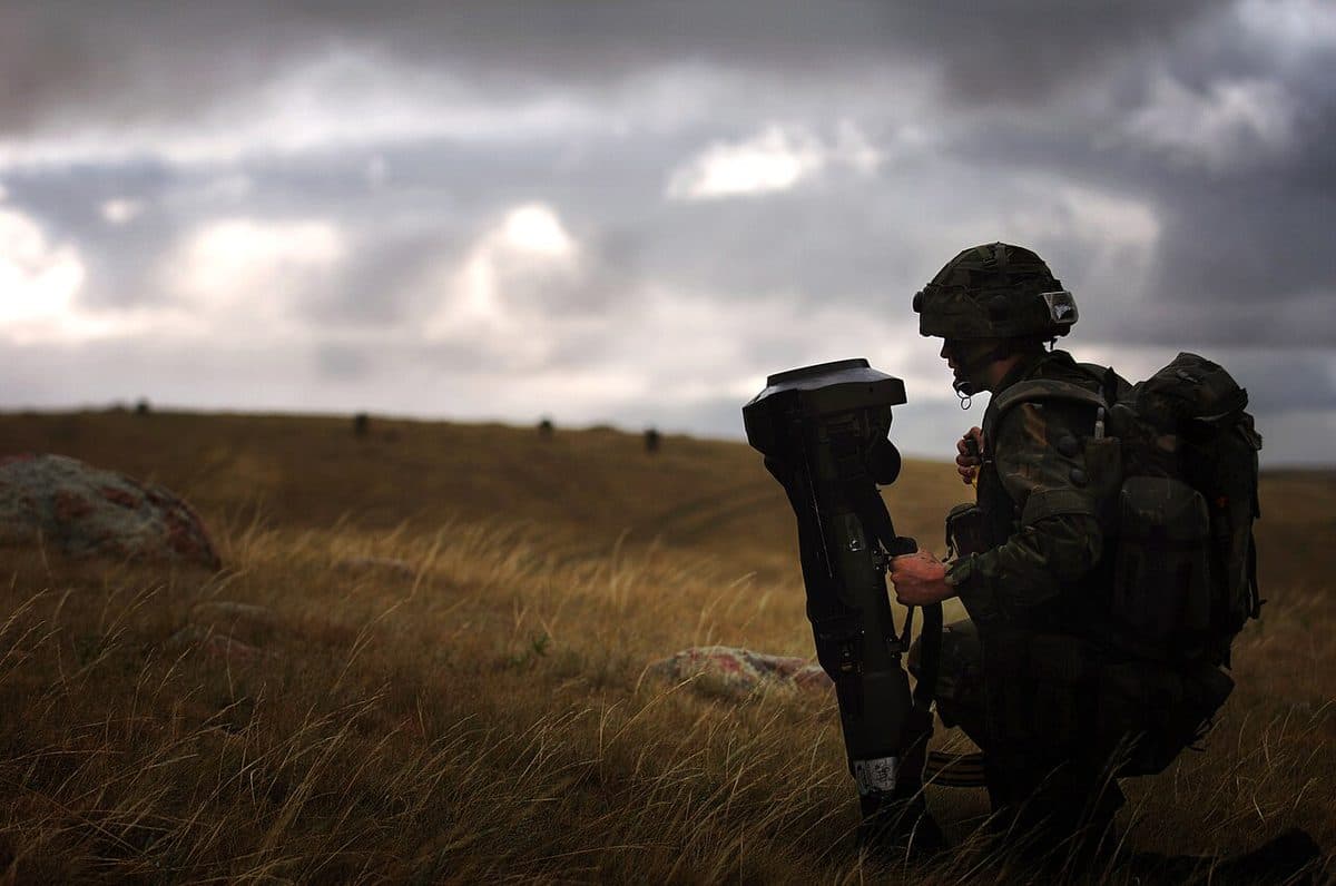 NLAW anti-tank missile being fired, showing the disposable launcher and backblast