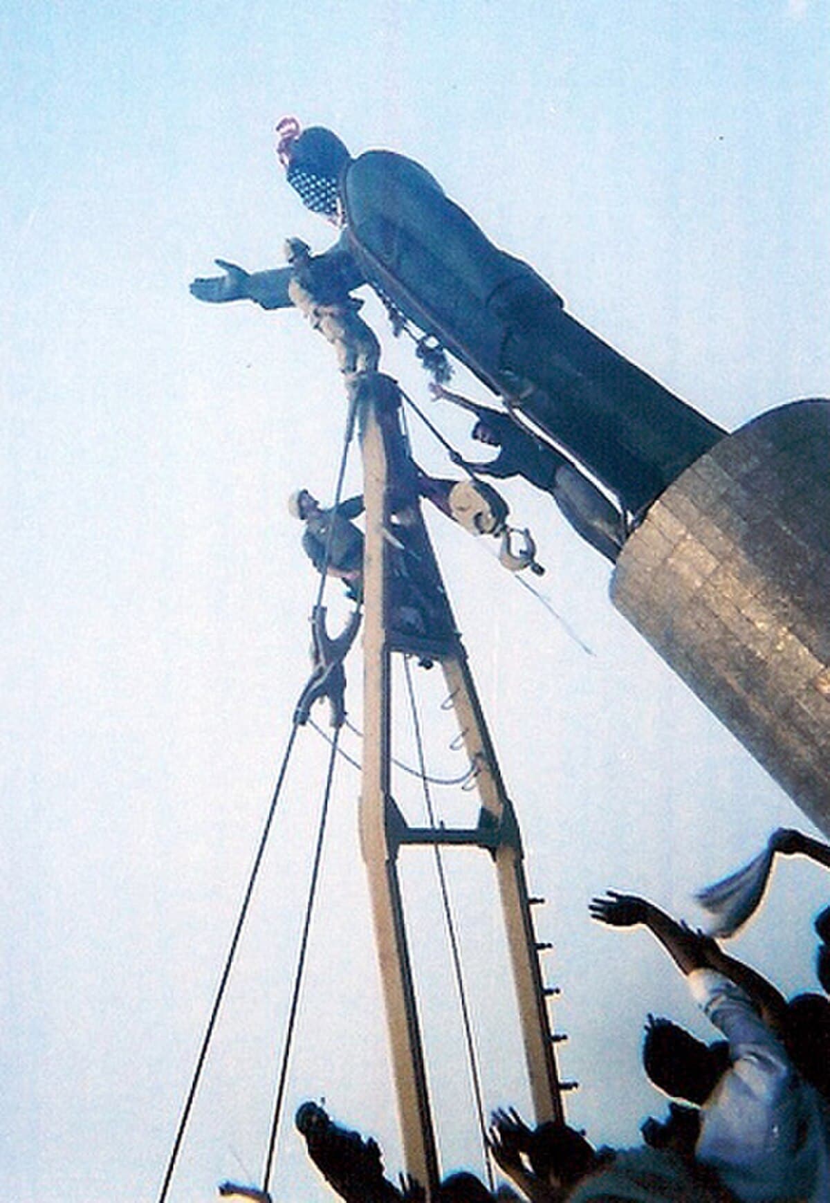 U.S. Army M1 Abrams tanks positioned near the crossed swords monument in central Baghdad, April 2003