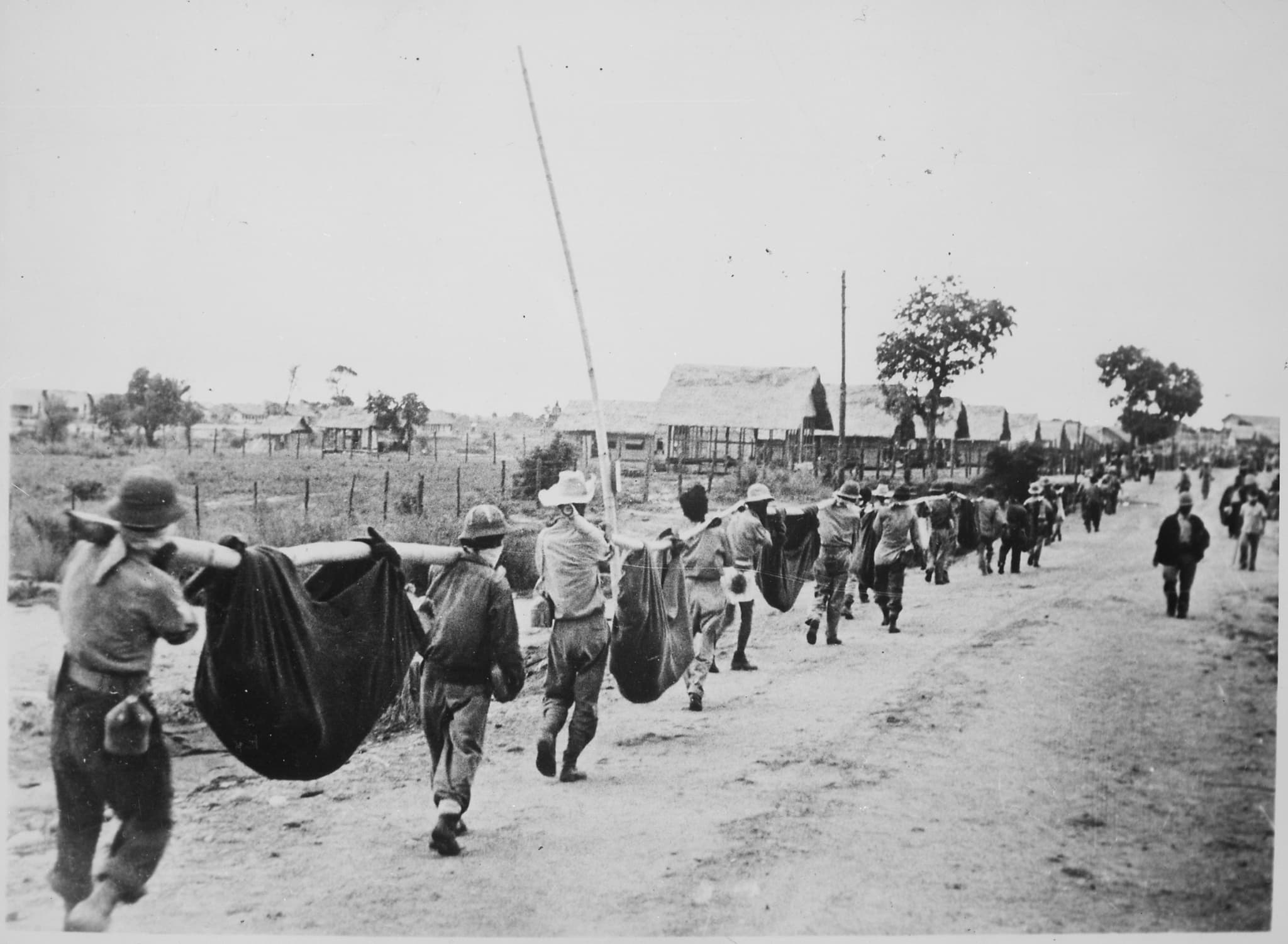 American troops advancing through the jungles of Bataan during the 1945 liberation