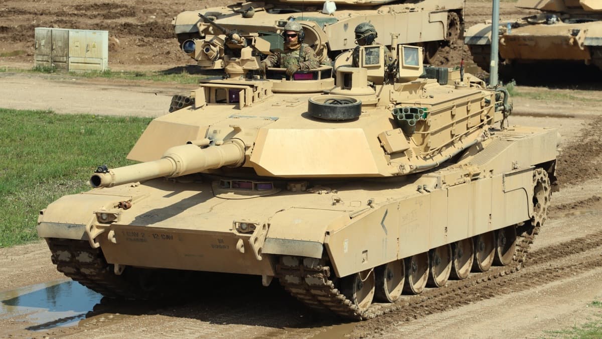 M1 Abrams tanks advancing across the desert during the Gulf War ground offensive