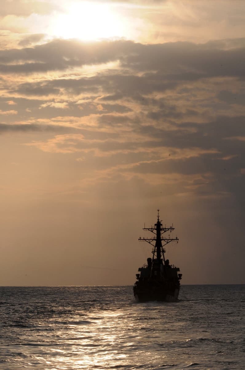 USS Yorktown listing after being struck by Japanese torpedoes at the Battle of Midway