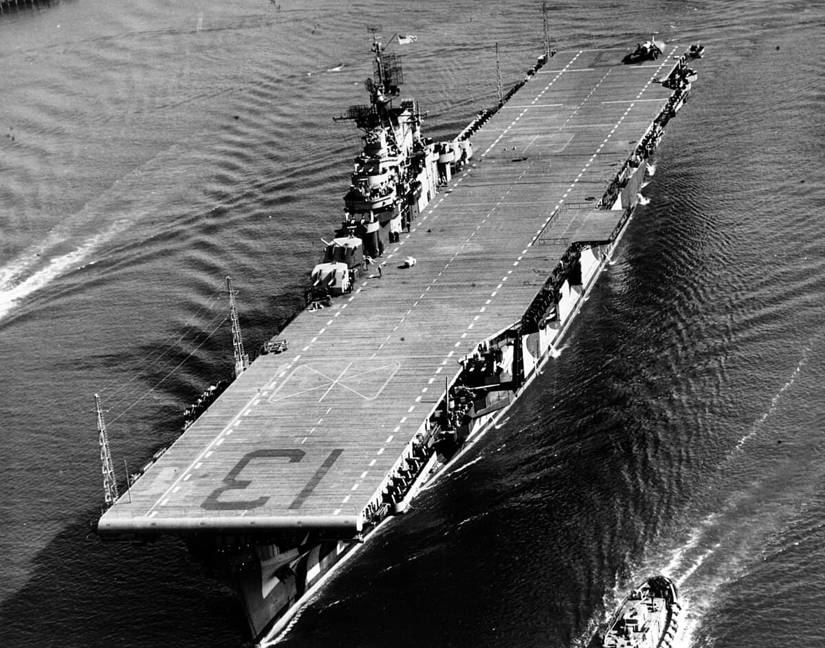 The aircraft carrier USS Franklin engulfed in smoke and flames after being struck by Japanese bombs off Shikoku, March 19, 1945