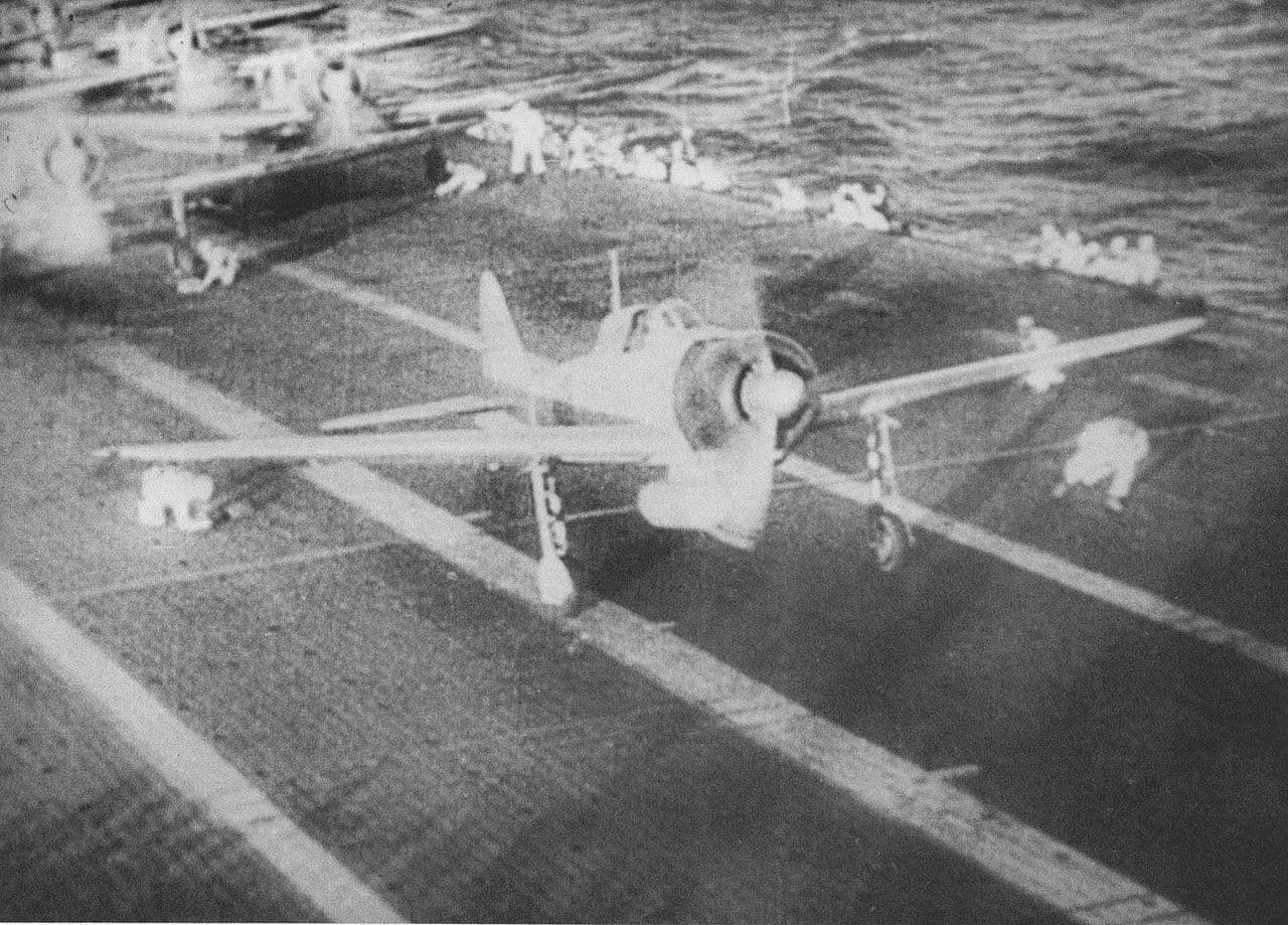 A6M Zero fighters preparing for the attack on Pearl Harbor aboard a Japanese carrier, December 1941