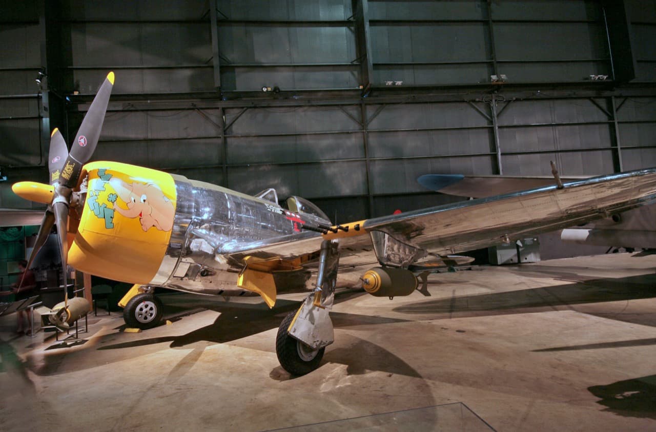 P-47D Thunderbolt bubbletop variant in natural metal finish with yellow nose art