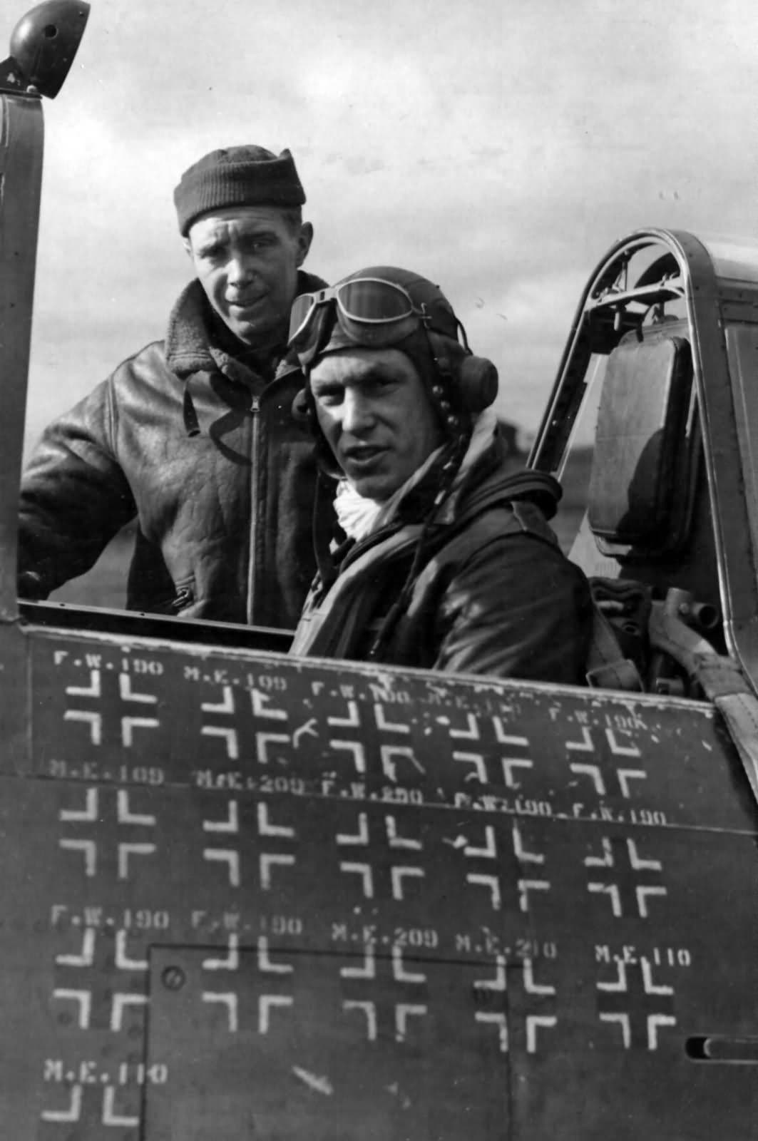 Captain Robert S. Johnson in the cockpit of his P-47 Thunderbolt with Luftwaffe kill markings on the fuselage