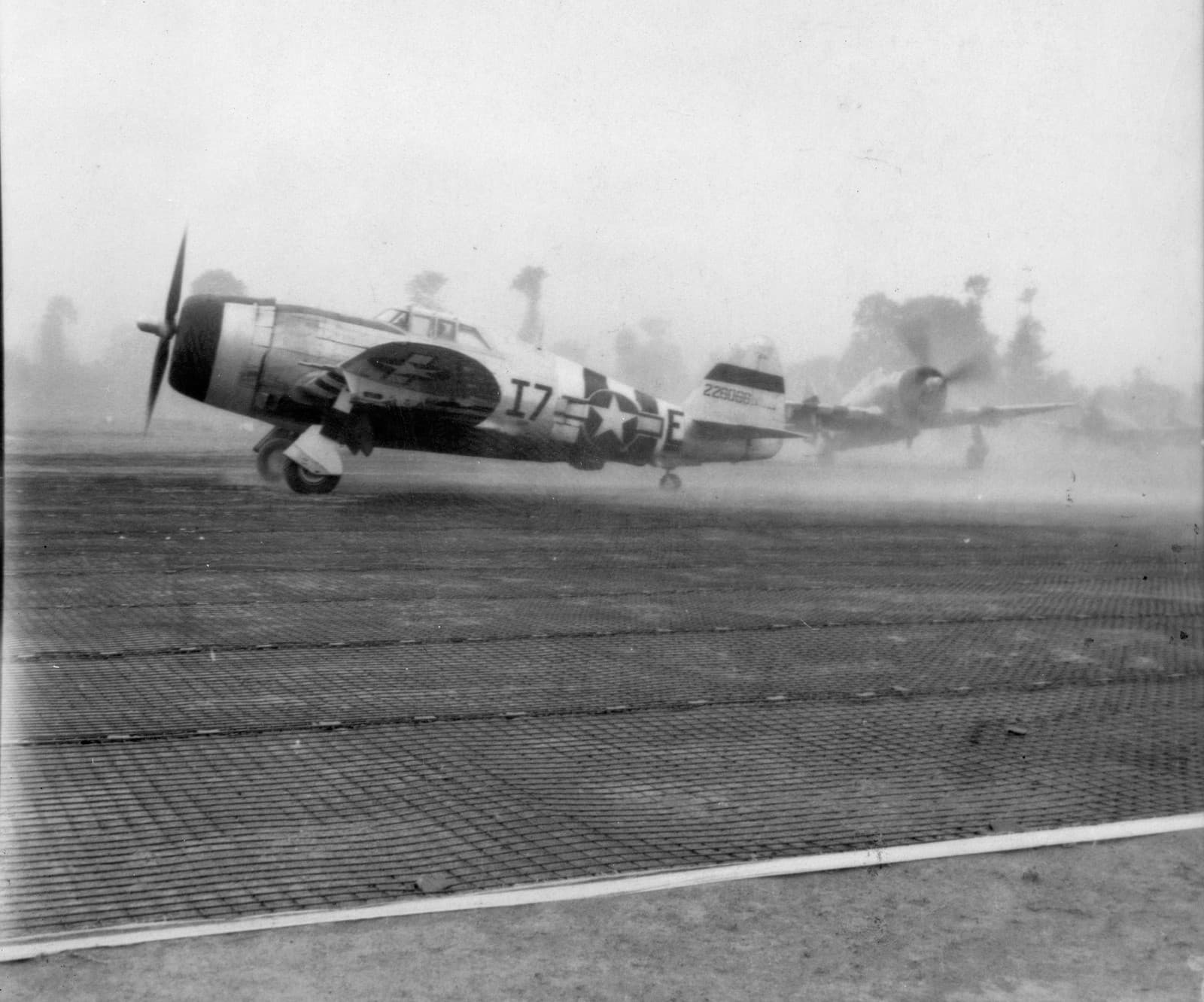 P-47D Thunderbolts of the 48th Fighter Group taking off from Deux Jumeaux Airfield (A-4) in Normandy, 1944