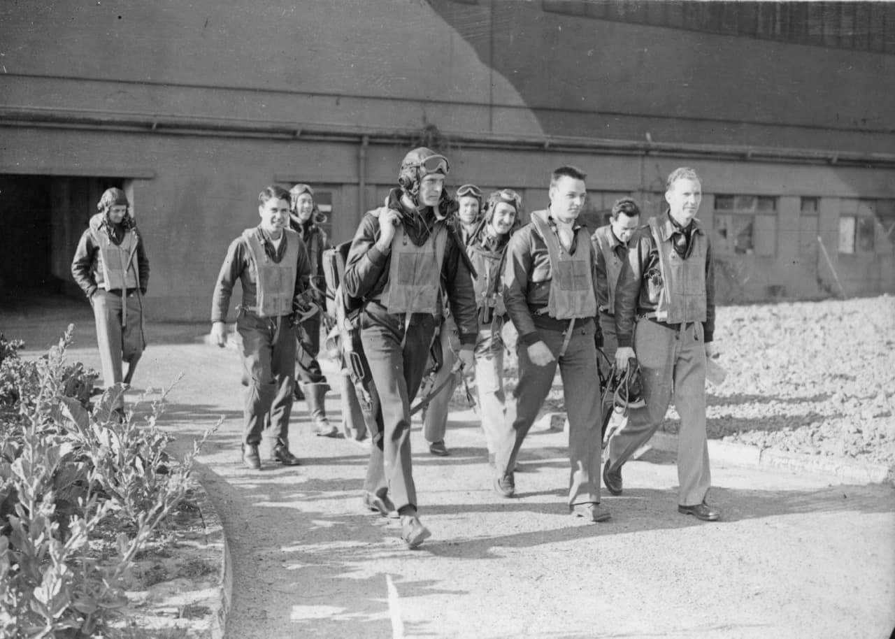 USAAF fighter pilots walking together at an English base, 56th Fighter Group, 1943