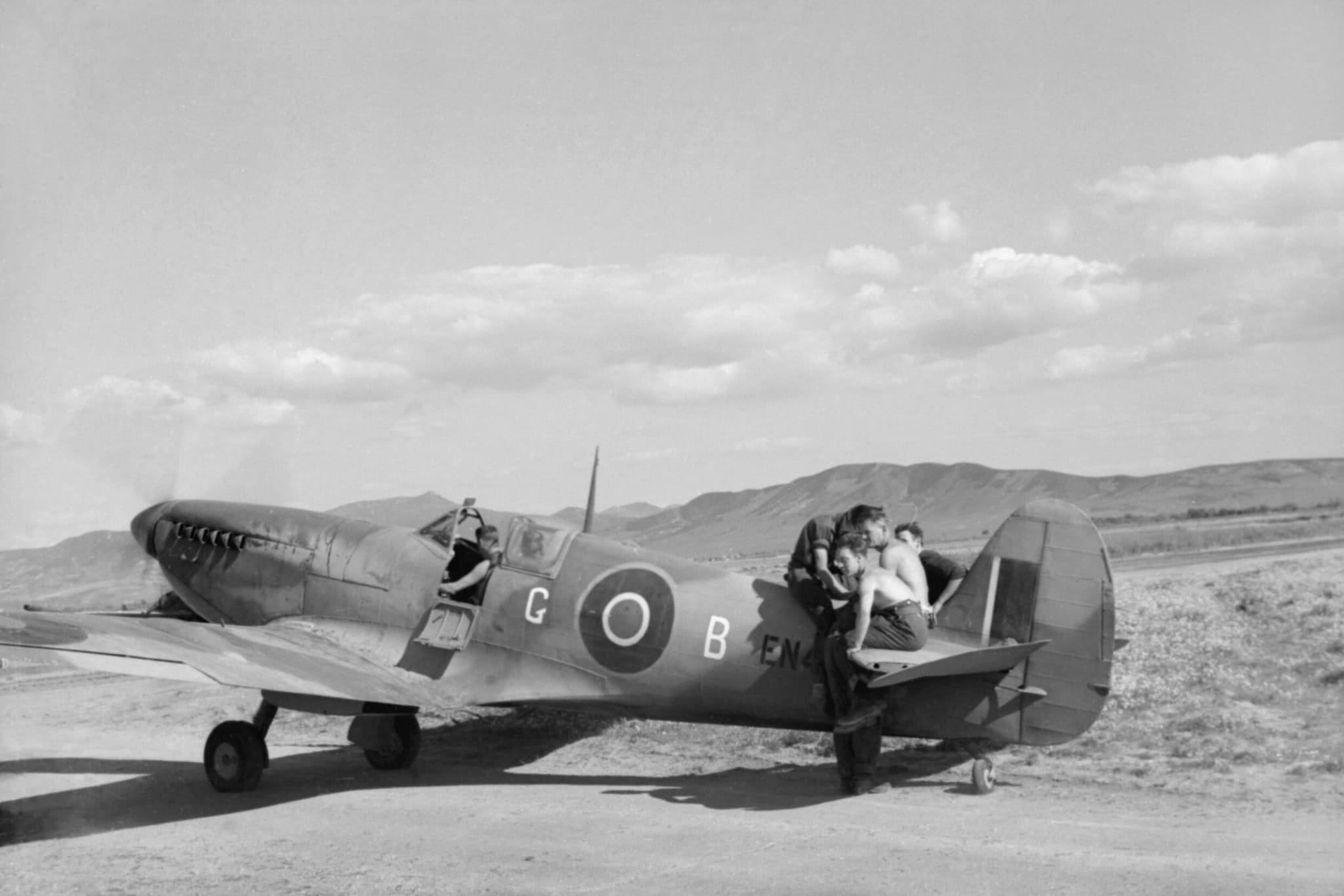 RAF ground crew performing engine test on a Spitfire Mk IX in Tunisia