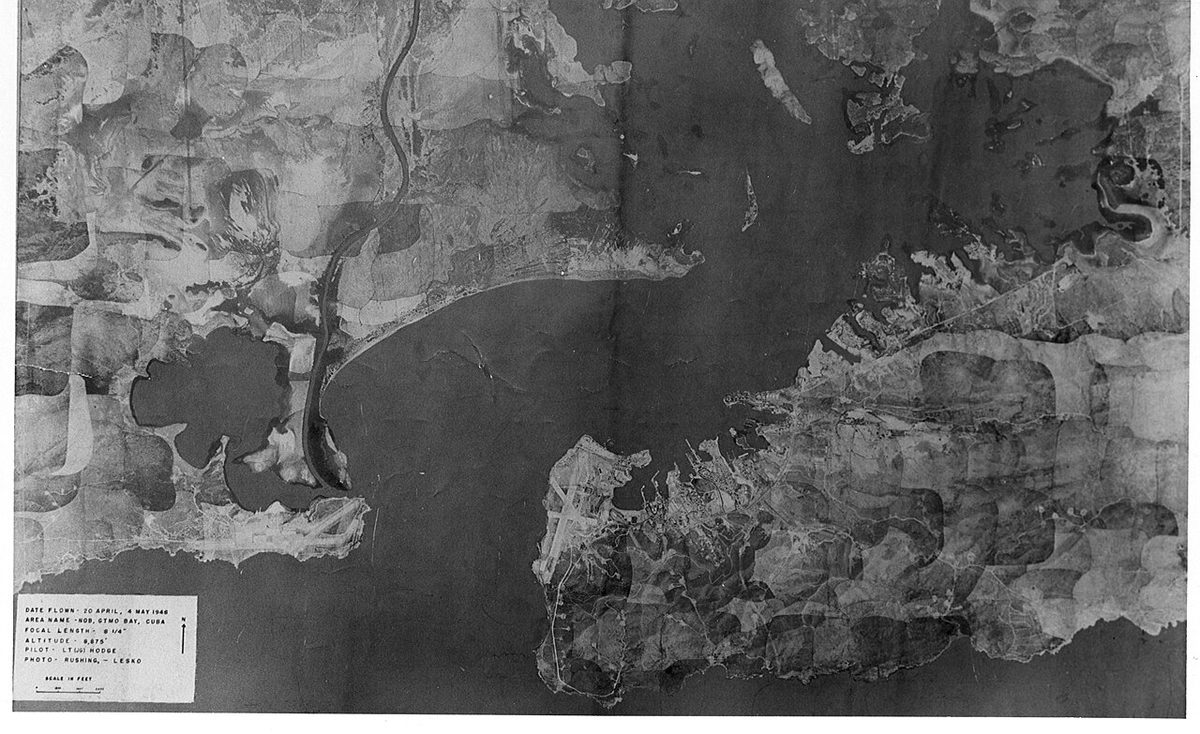 Aerial view of Guantanamo Bay Naval Base in Cuba showing harbor and military facilities