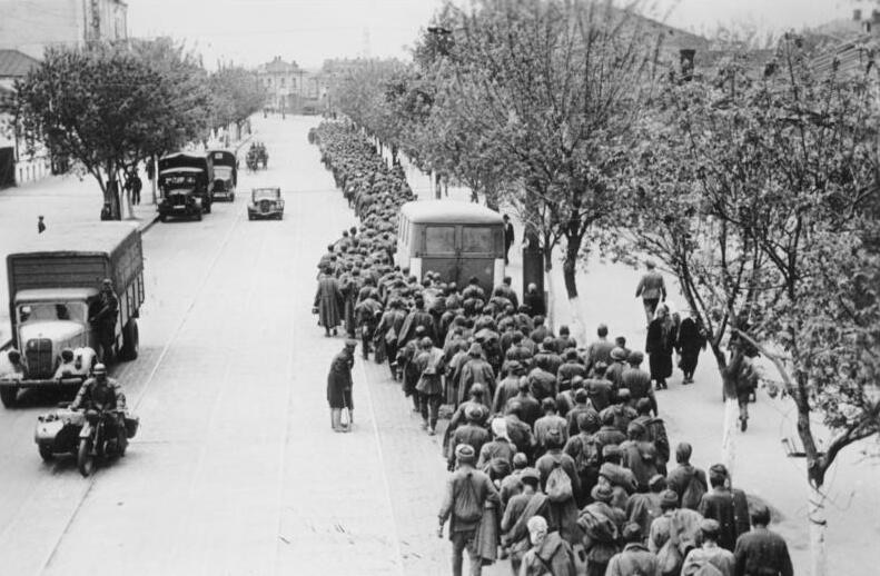 Soviet prisoners of war marching through the streets of Kharkov after the German victory in 1942