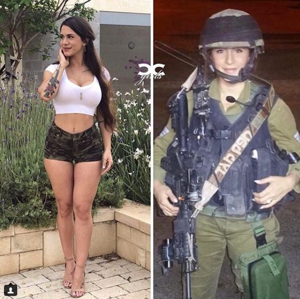 Female IDF soldier standing watch over Israeli terrain