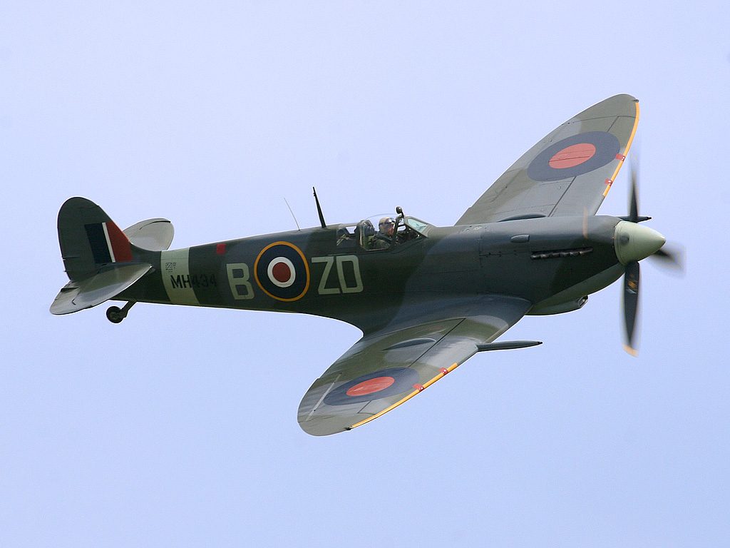 Supermarine Spitfire Mk V in RAF camouflage flying over the English Channel