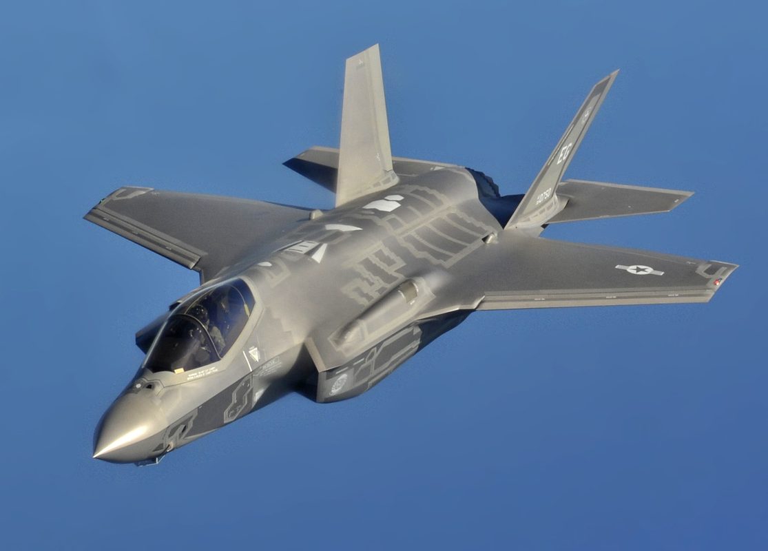 F-35A Lightning II in flight with weapons bay doors open