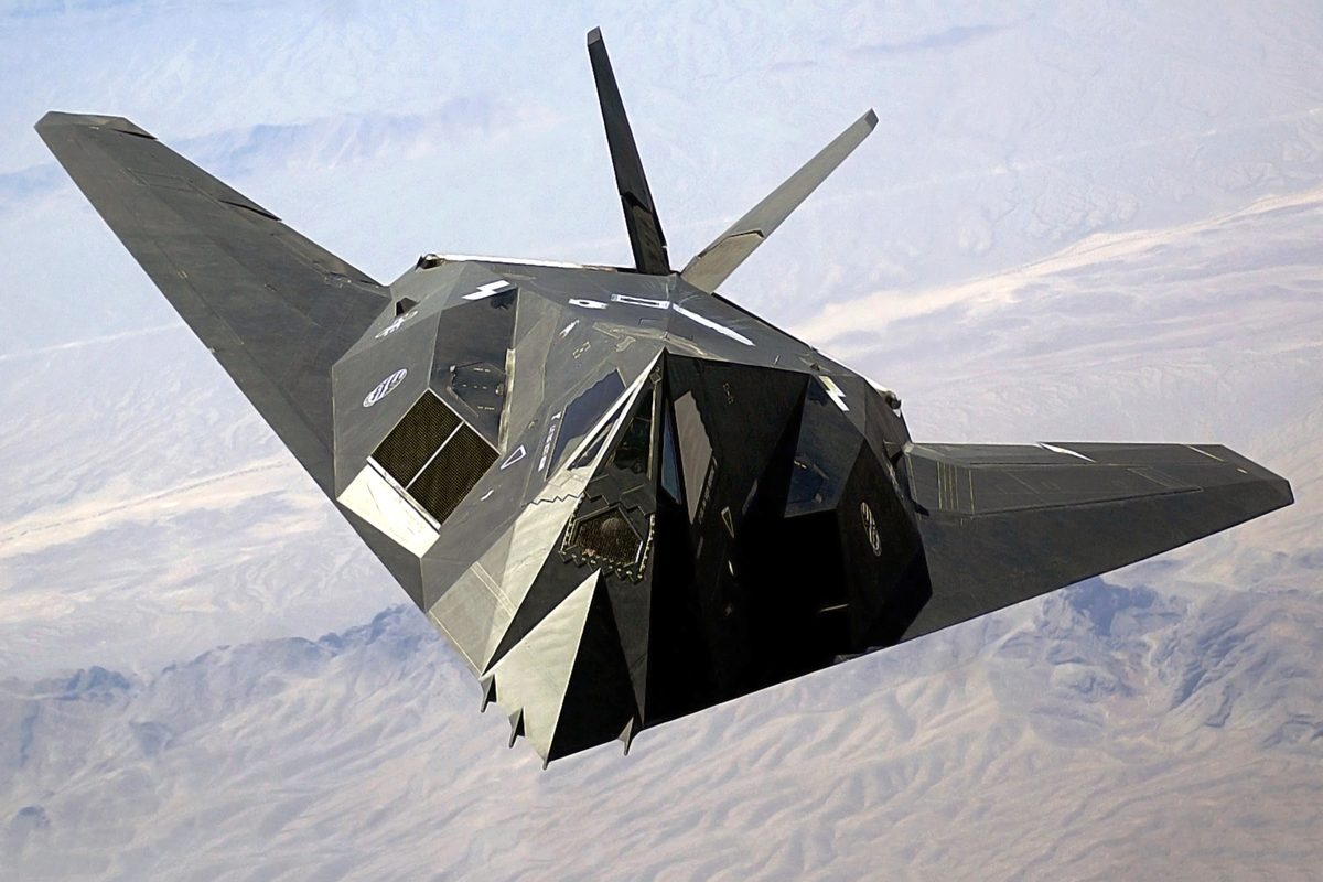 F-117 Nighthawk stealth fighter with angular faceted surfaces at twilight