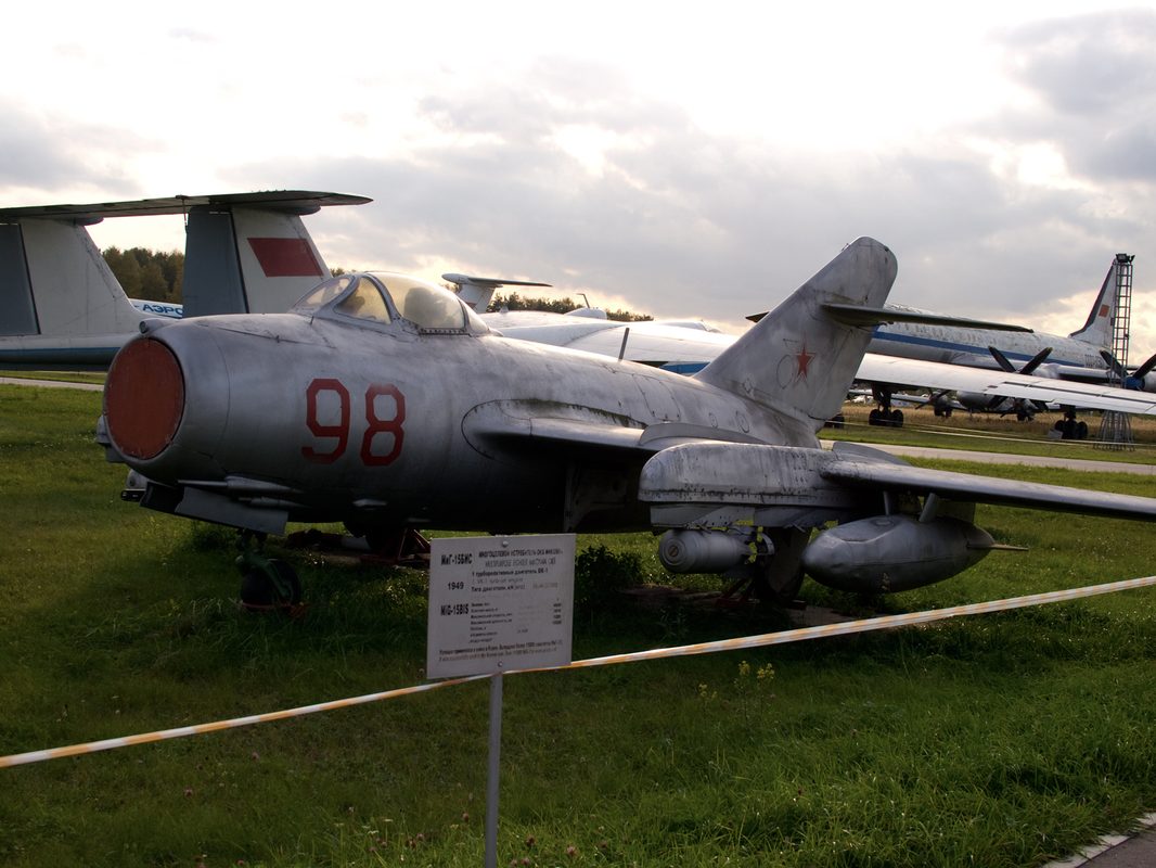 MiG-15 in North Korean markings diving with air brakes deployed