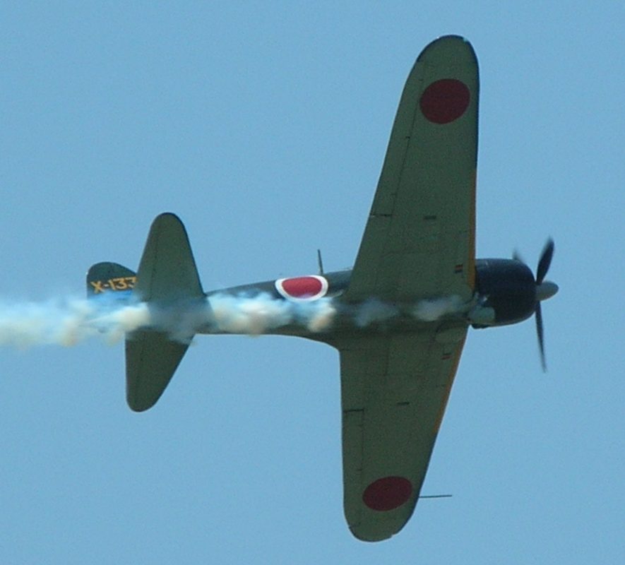 A6M Zero in Imperial Japanese Navy green camouflage over ocean