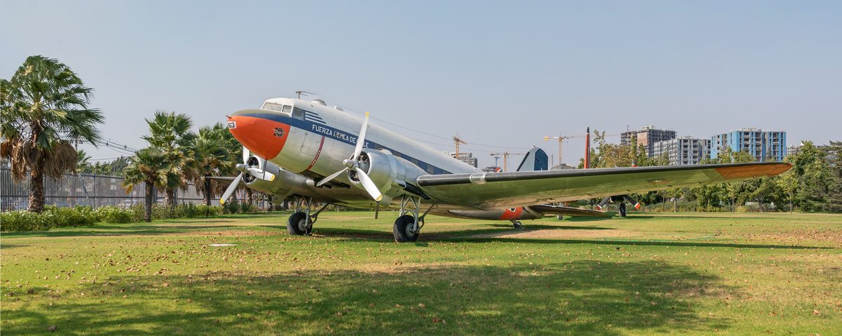 C-47 Skytrain dropping paratroopers with D-Day invasion stripes