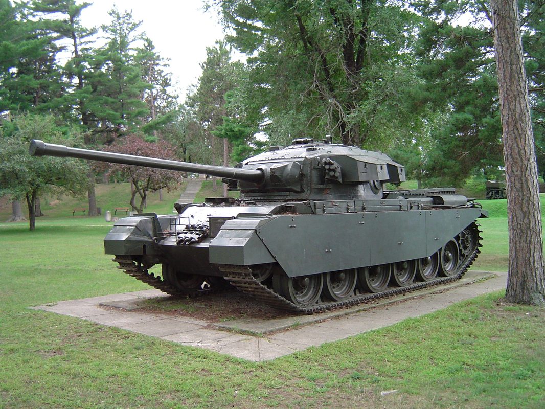 British Centurion tank in combat during the Korean War with infantry support