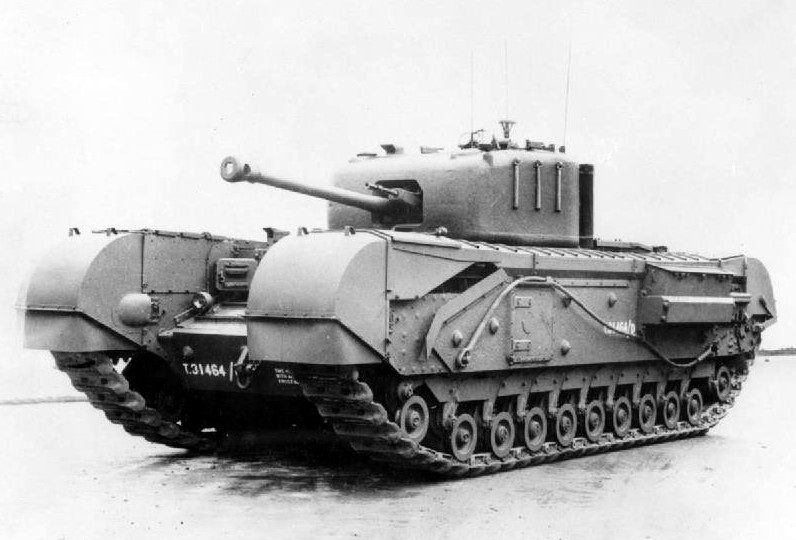 British Churchill tank climbing steep terrain with infantry following during World War II