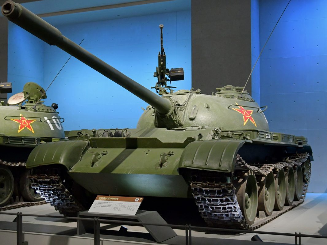 Chinese Type 59 tank column on the move displaying classic Soviet-influenced design