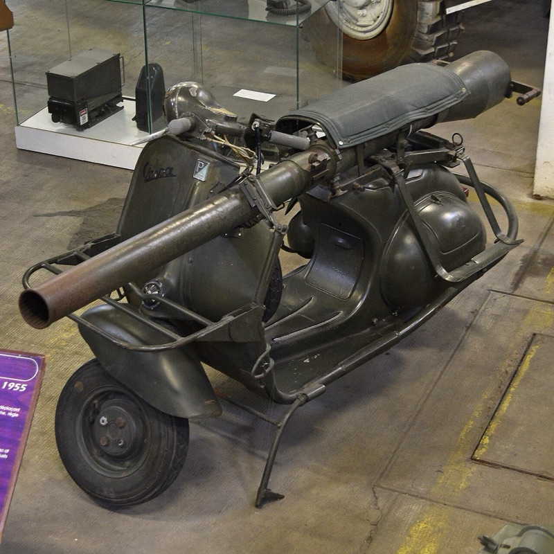 Vespa 150 TAP military scooter with mounted M20 recoilless rifle at a museum