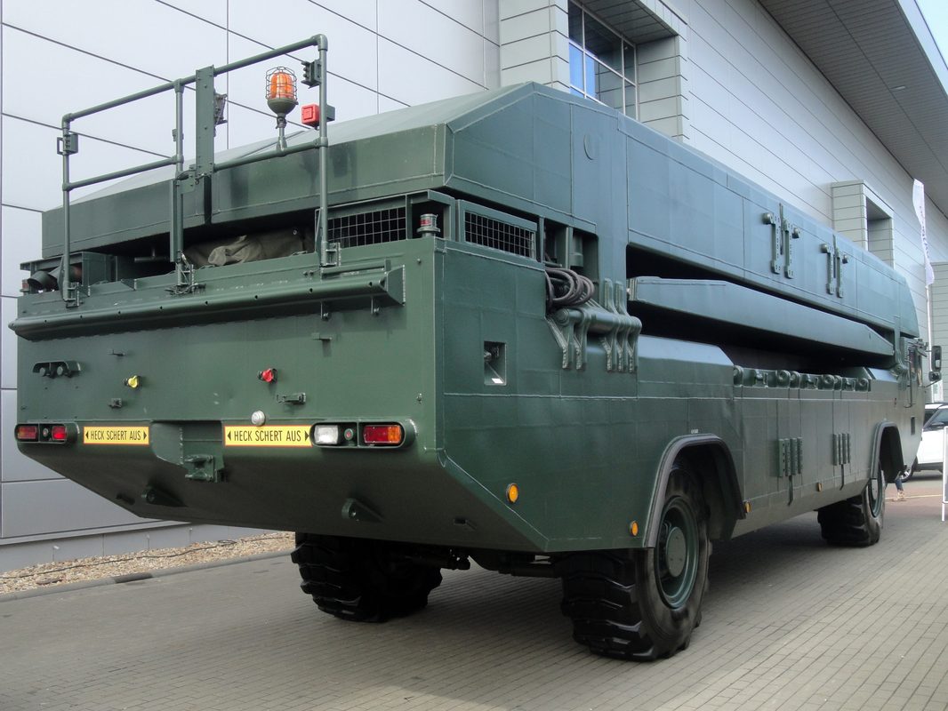 M3 Amphibious Rig forming a floating bridge section on a river