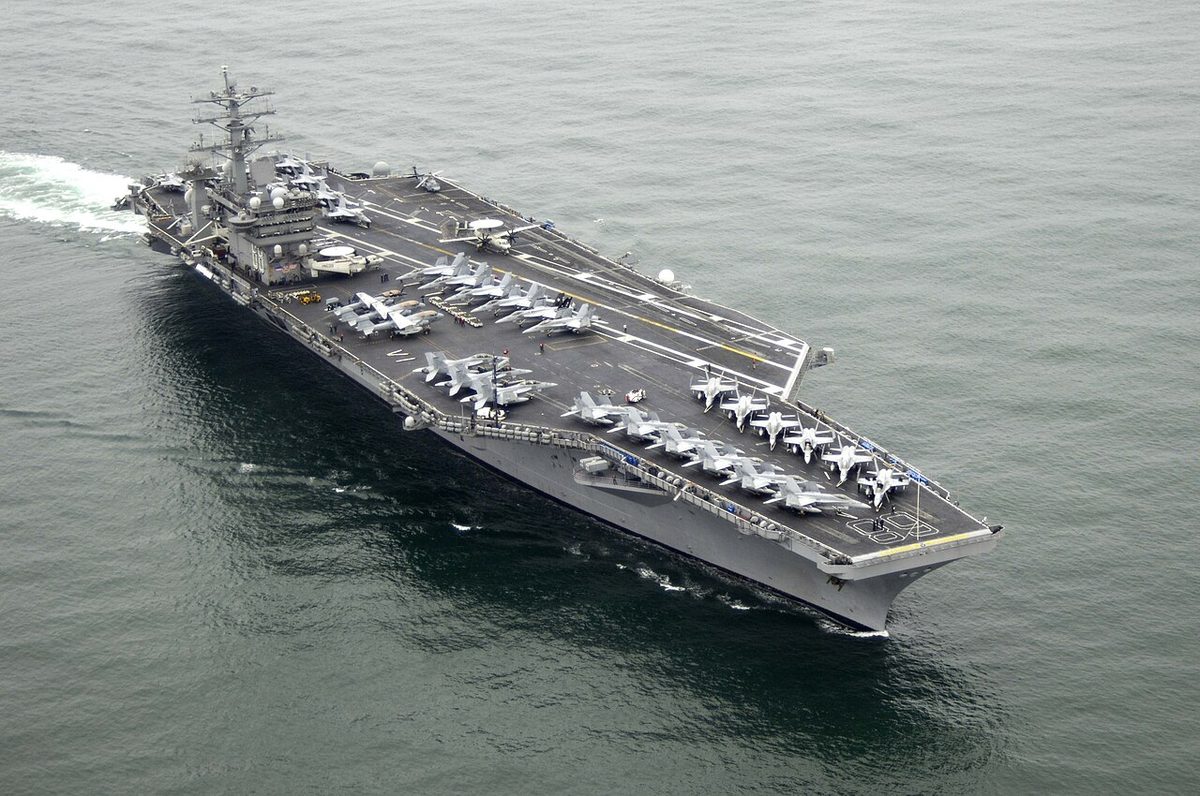 Nimitz-class nuclear aircraft carrier at sea with aircraft on flight deck