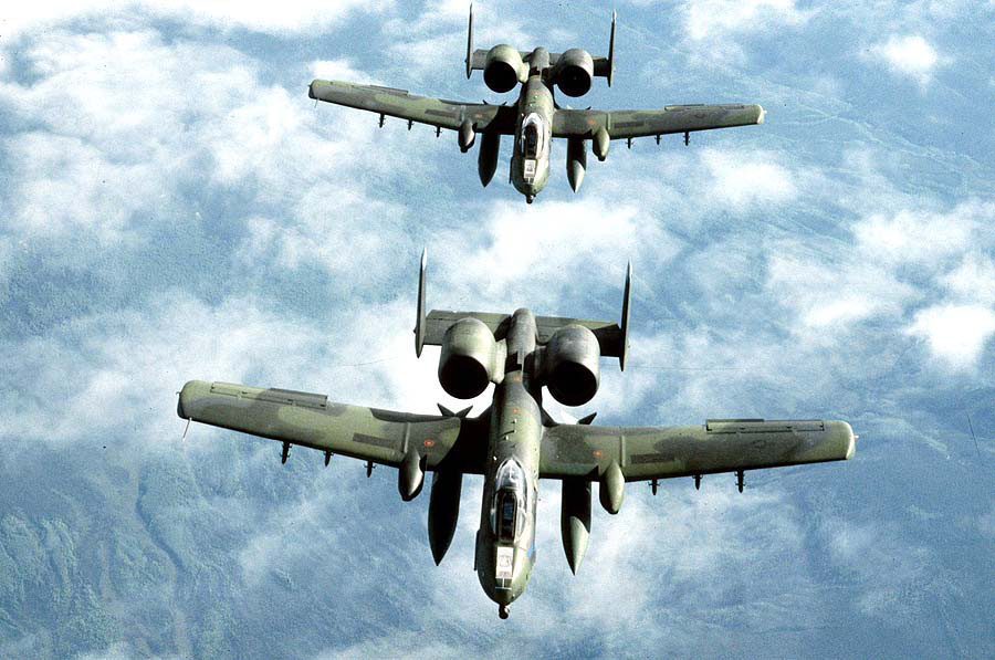A-10 Thunderbolt II silhouetted against a dawn sky, preparing for an early morning combat mission
