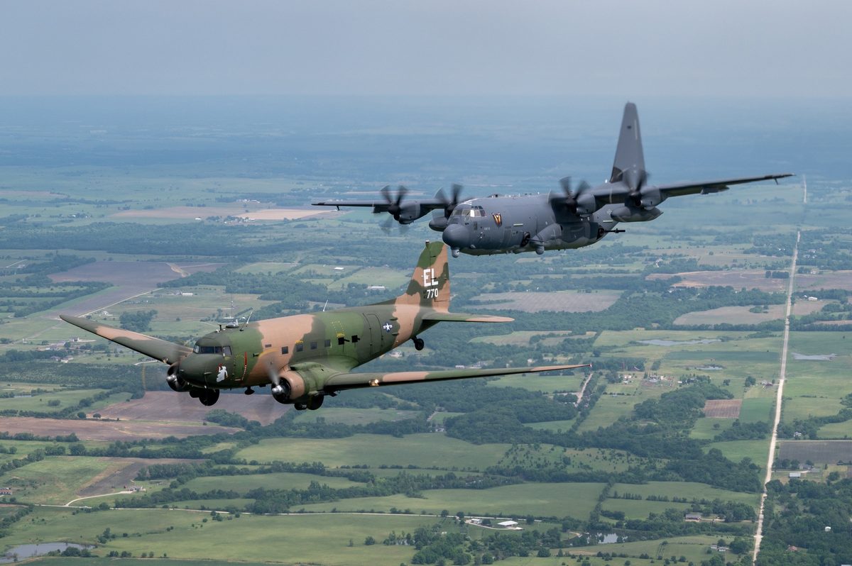 AC-47 Spooky and AC-130J Ghostrider flying in formation during a legacy flight