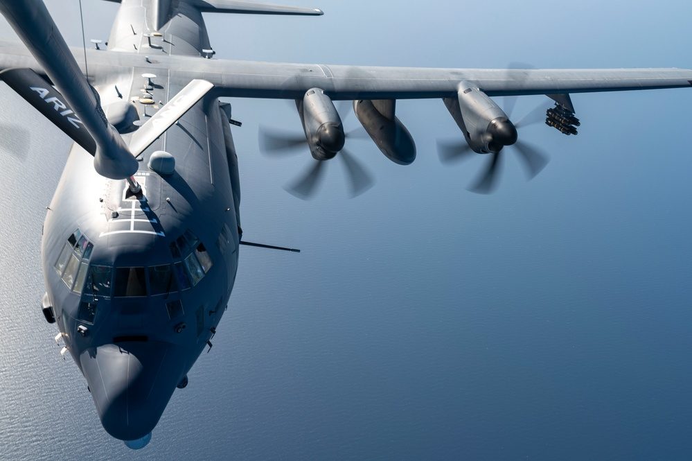 AC-130J Ghostrider in flight during aerial refueling viewed from above