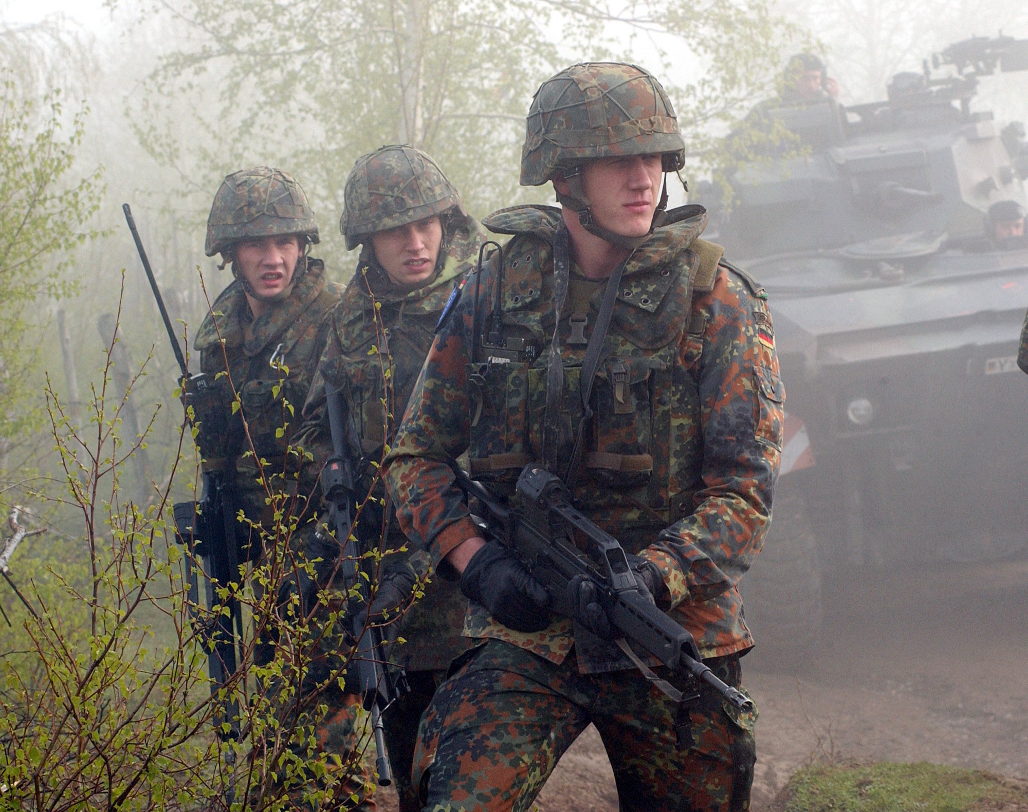 German Bundeswehr soldiers in field gear during a multinational NATO training exercise