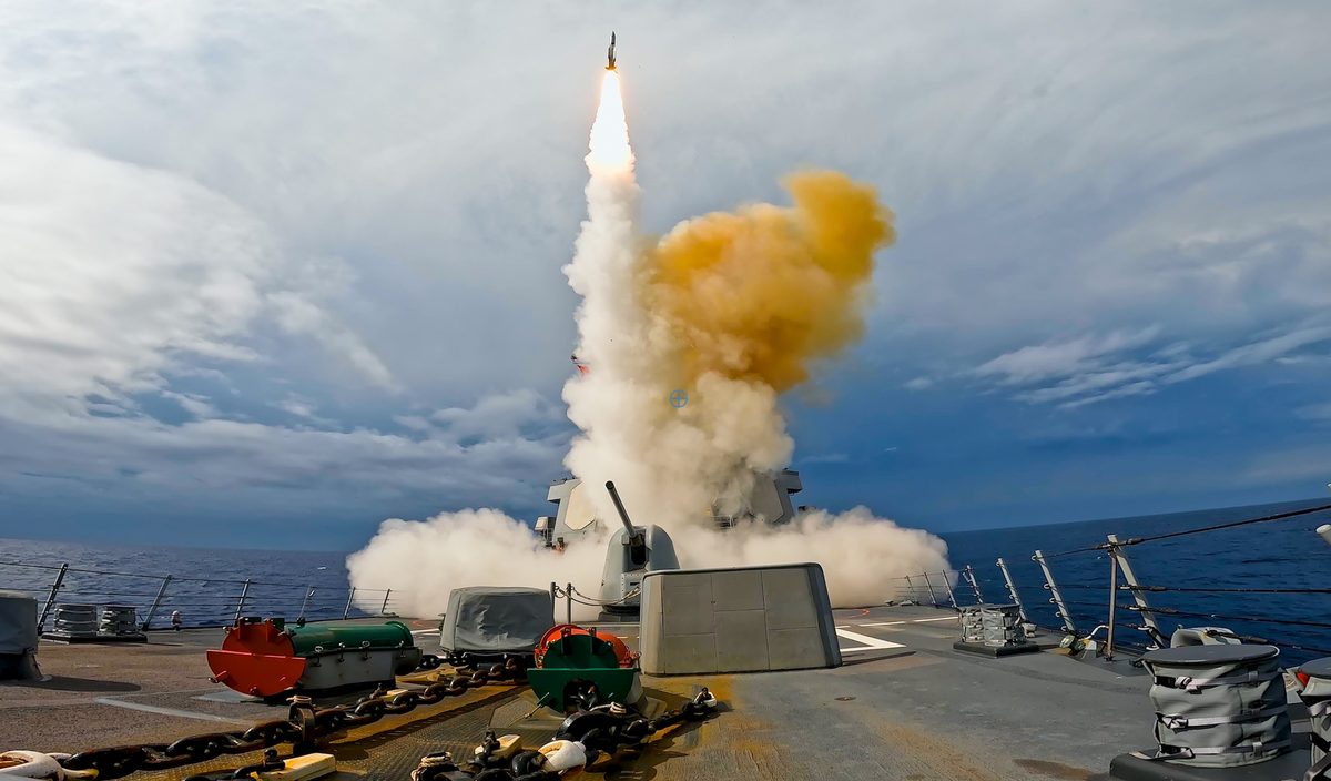 Standard Missile 2 launching from an Arleigh Burke-class destroyer's vertical launch system during a live-fire exercise