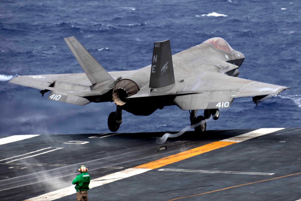 Fighter jet providing combat air patrol for carrier defense