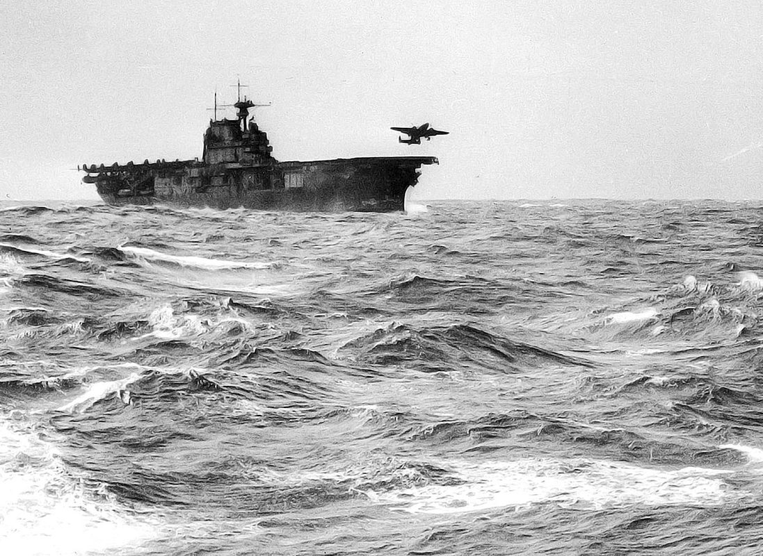 A B-25B Mitchell bomber launching from USS Hornet's flight deck during the Doolittle Raid, April 18, 1942