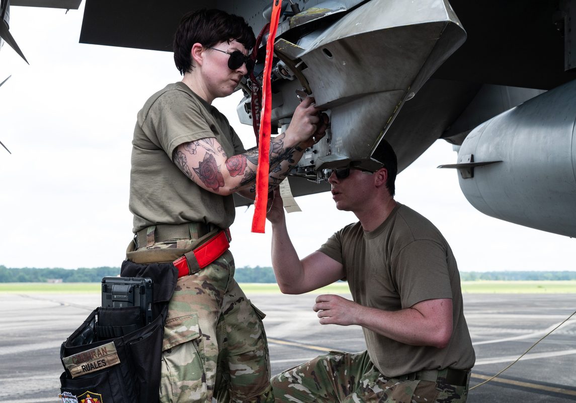 F-16 Fighting Falcon loaded with precision munitions on the flight line at Shaw Air Force Base