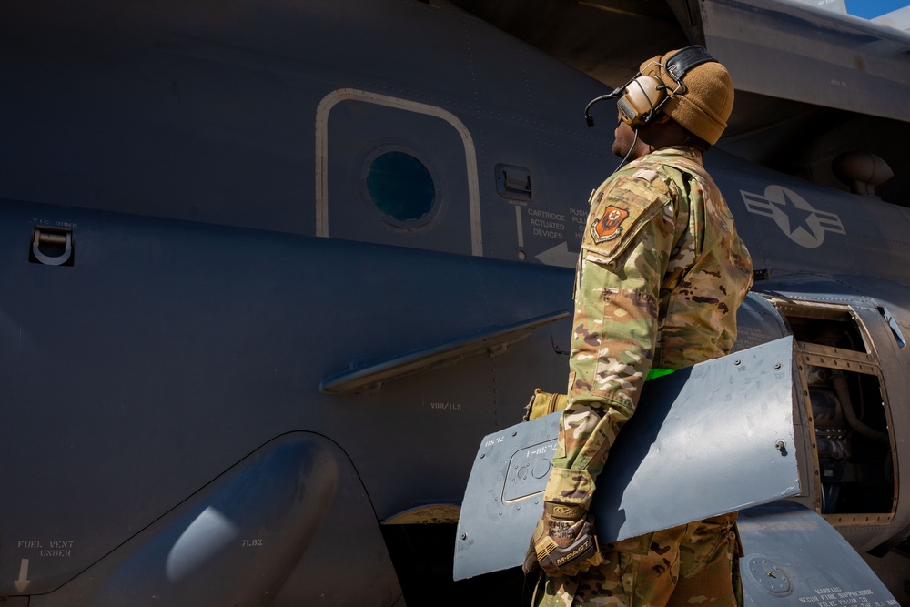 Air Commandos performing maintenance on a CV-22 Osprey