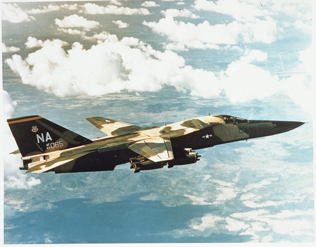 F-111 Aardvark with variable-geometry wings in flight