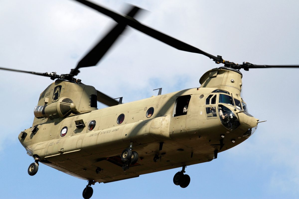 CH-47 Chinook tandem-rotor helicopter in flight with United States Army markings