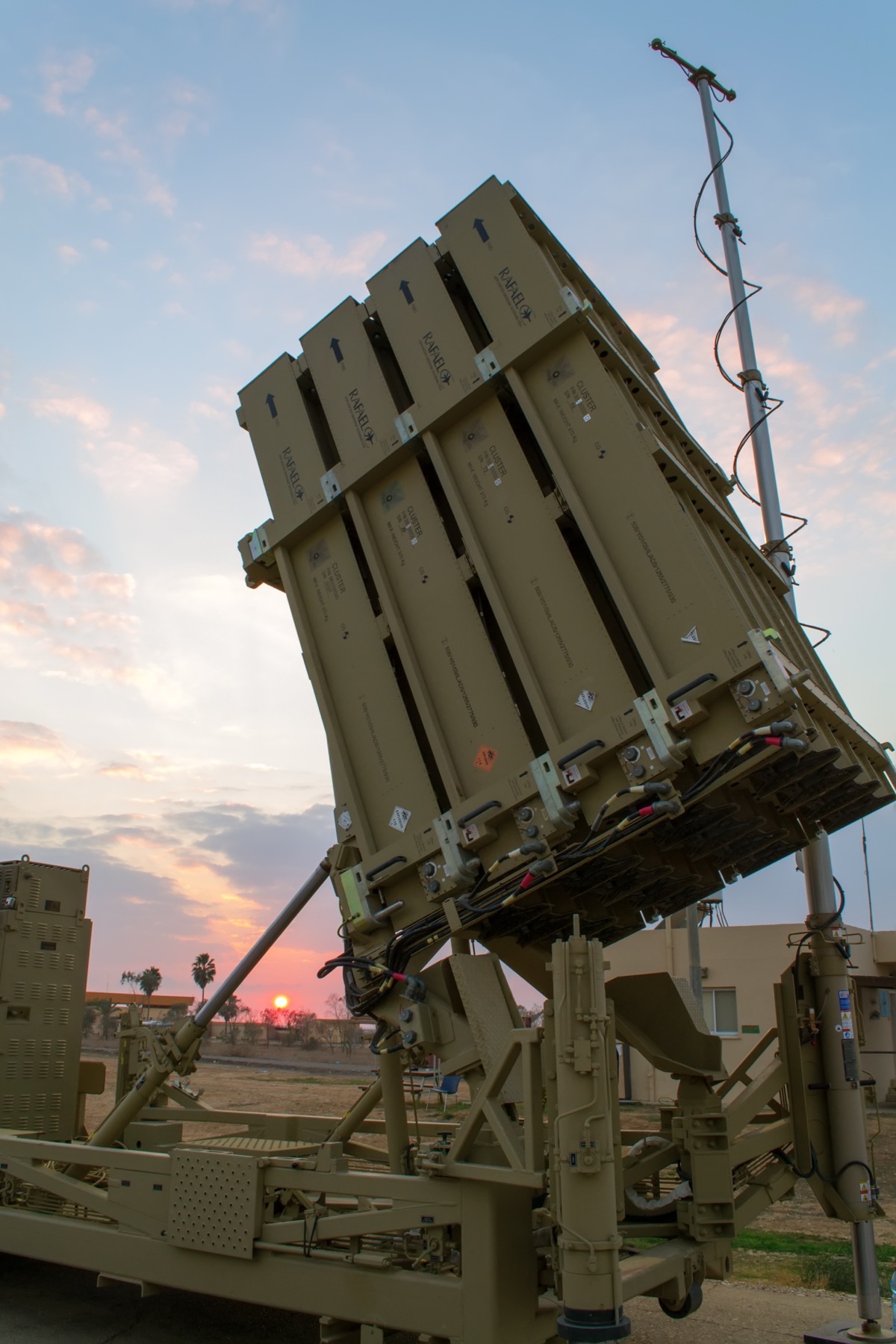 Close-up view of a Tamir interceptor missile in its launch canister showing the missile's seeker head and fins