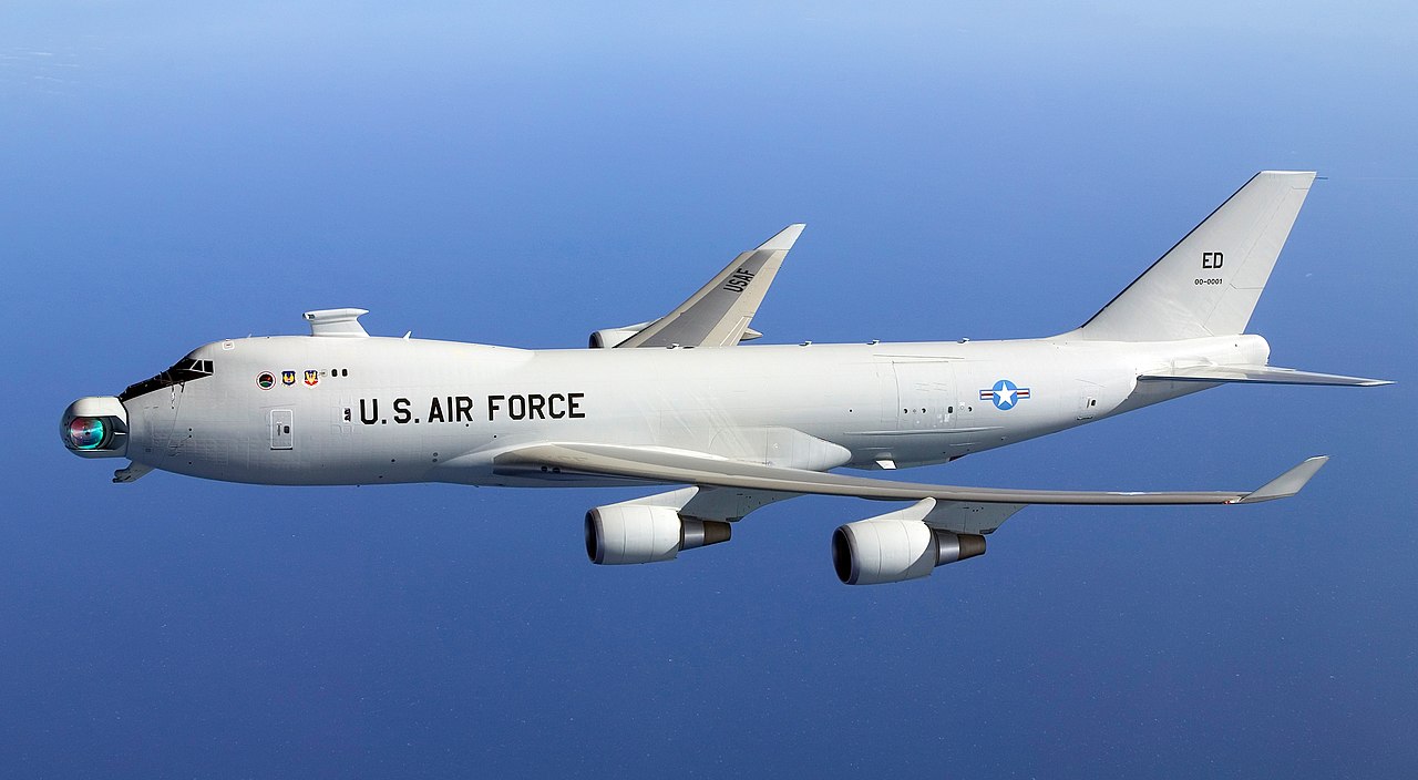 Conceptual rendering of a fighter aircraft equipped with a directed energy weapon pod