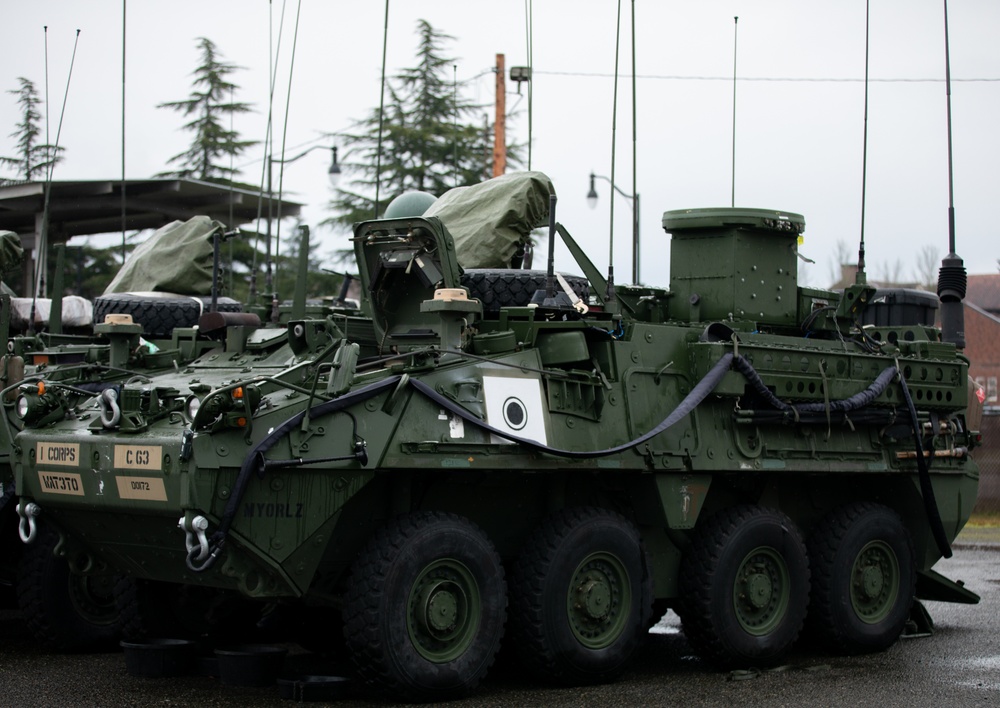 A Stryker armored vehicle undergoing daily maintenance checks