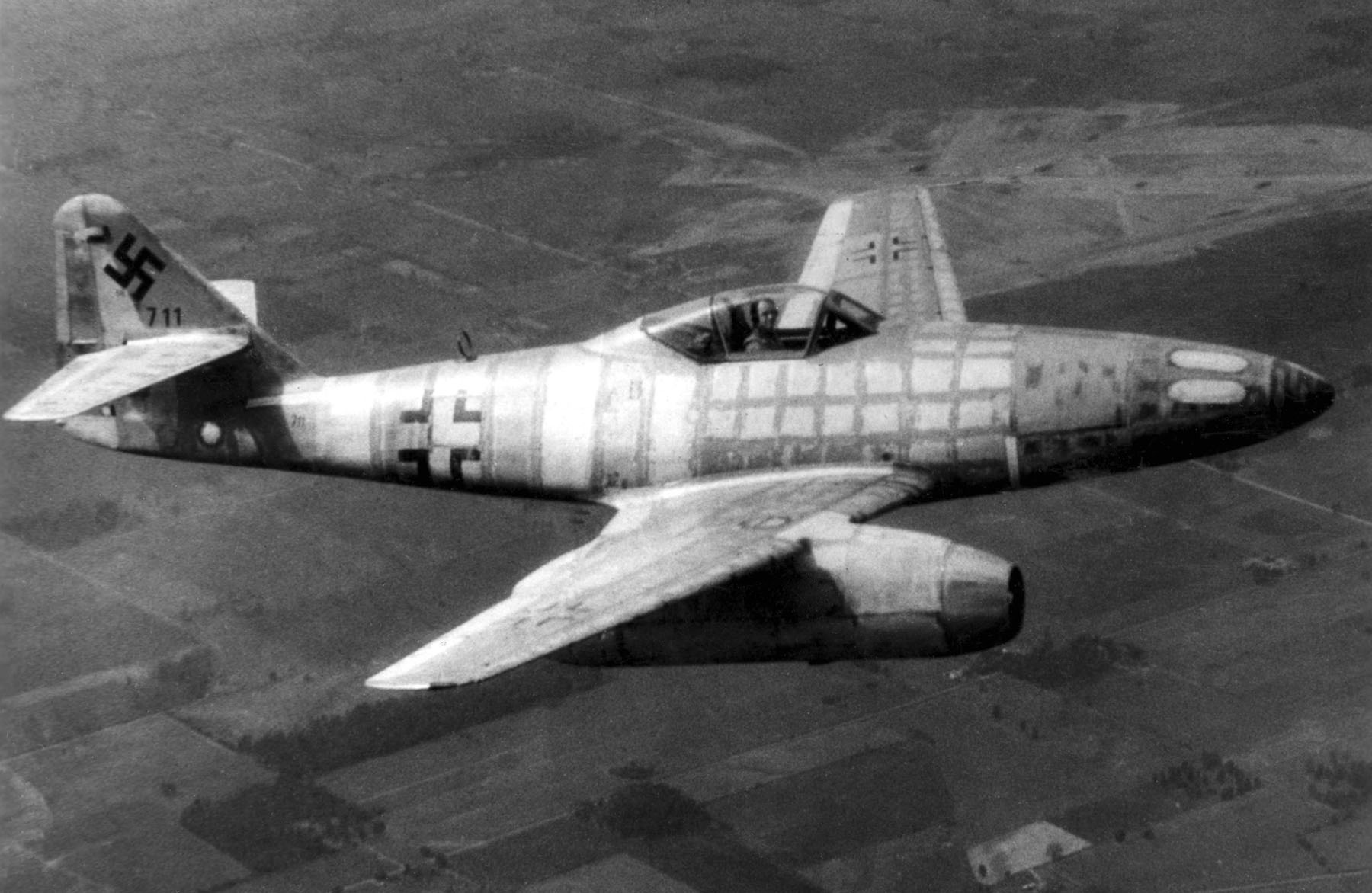 Messerschmitt Me 262 in flight showing its revolutionary twin-jet configuration that made it 100 mph faster than any Allied fighter