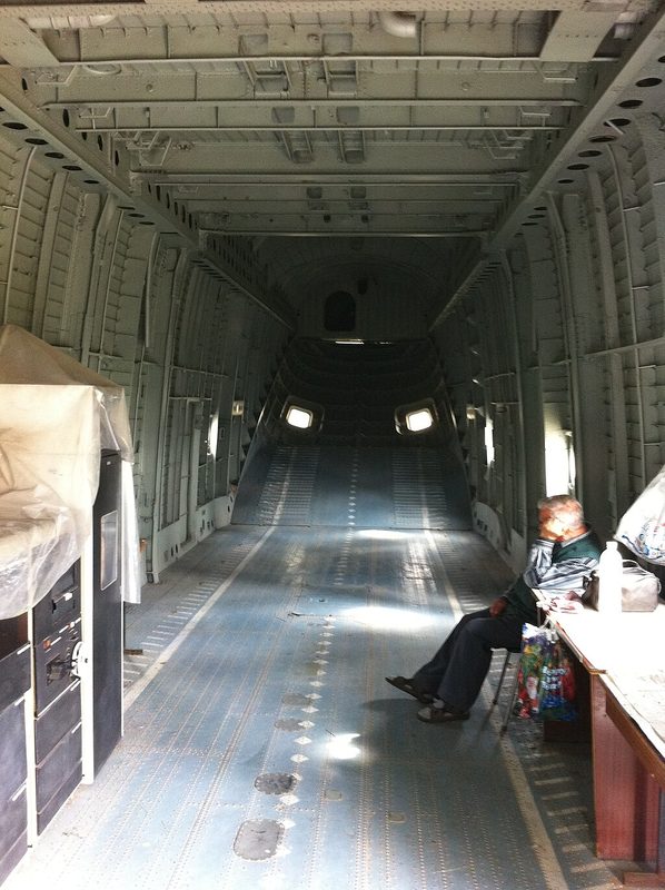 Mi-26 Halo massive cargo bay interior with a person for scale showing its C-130-sized hold