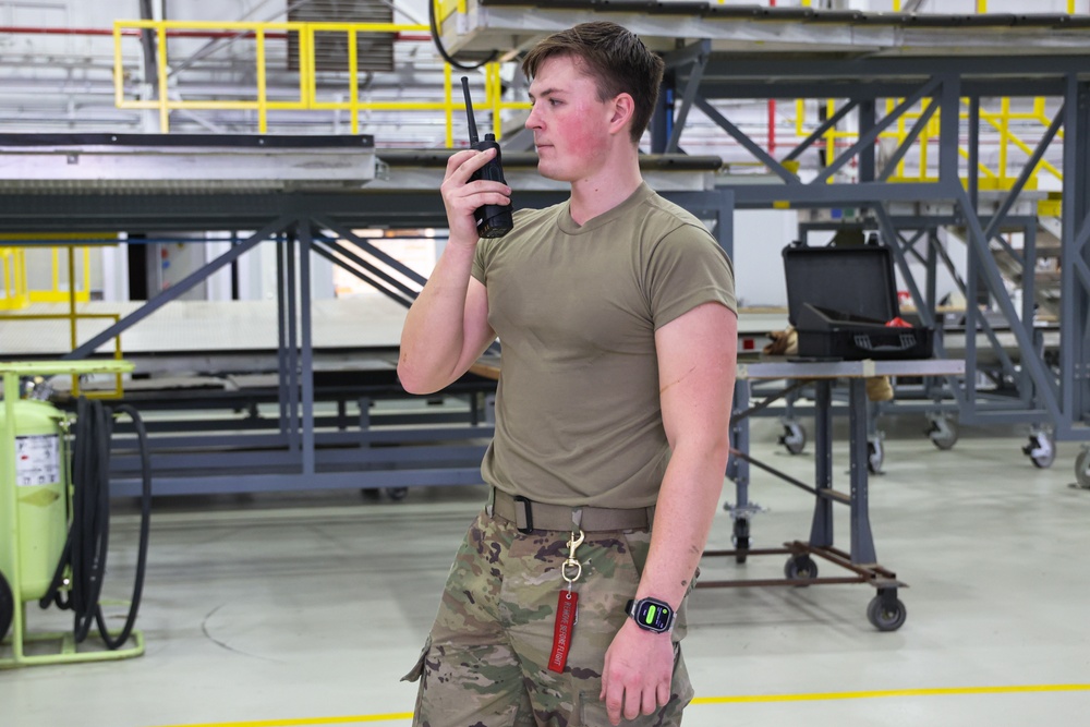 Crew Chief conducts post-flight inspection of KC-135 Stratotanker