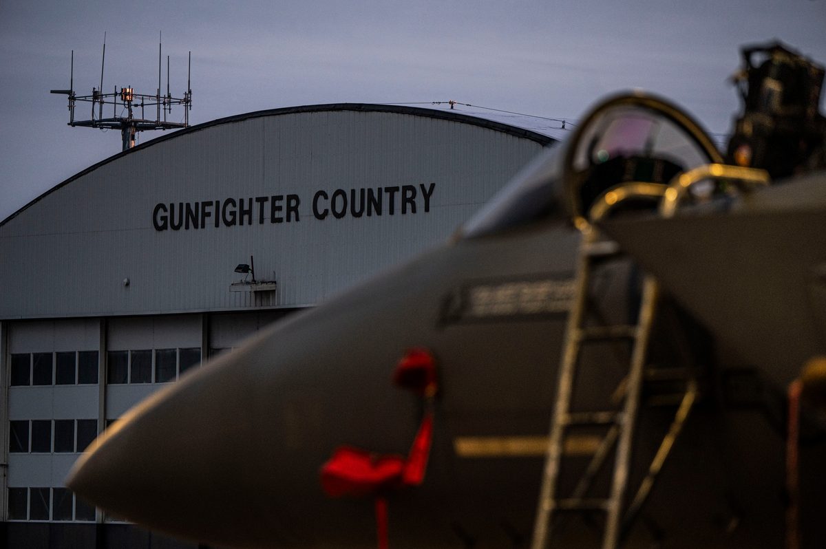 F-15E Strike Eagle on the flight line loaded with ordnance