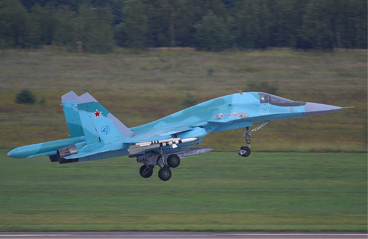 Russian Air Force Su-34 Fullback in flight showing the aircraft's distinctive flat nose and side-by-side cockpit