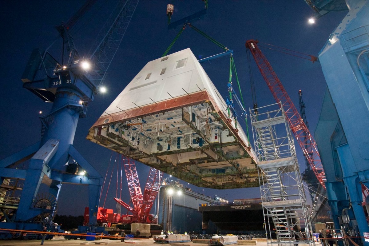 Zumwalt-class composite deckhouse and integrated mast showing the ship's angular stealth design