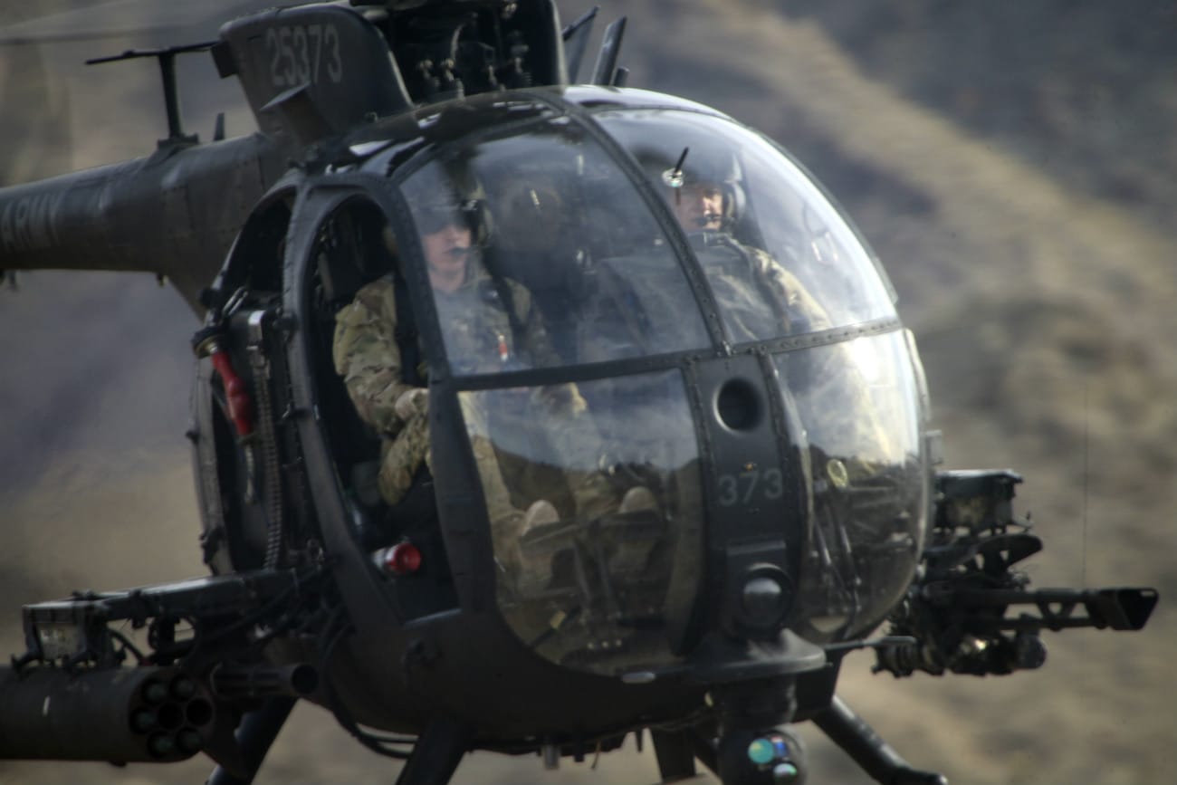 MH-6 Little Bird flying over designated targets
